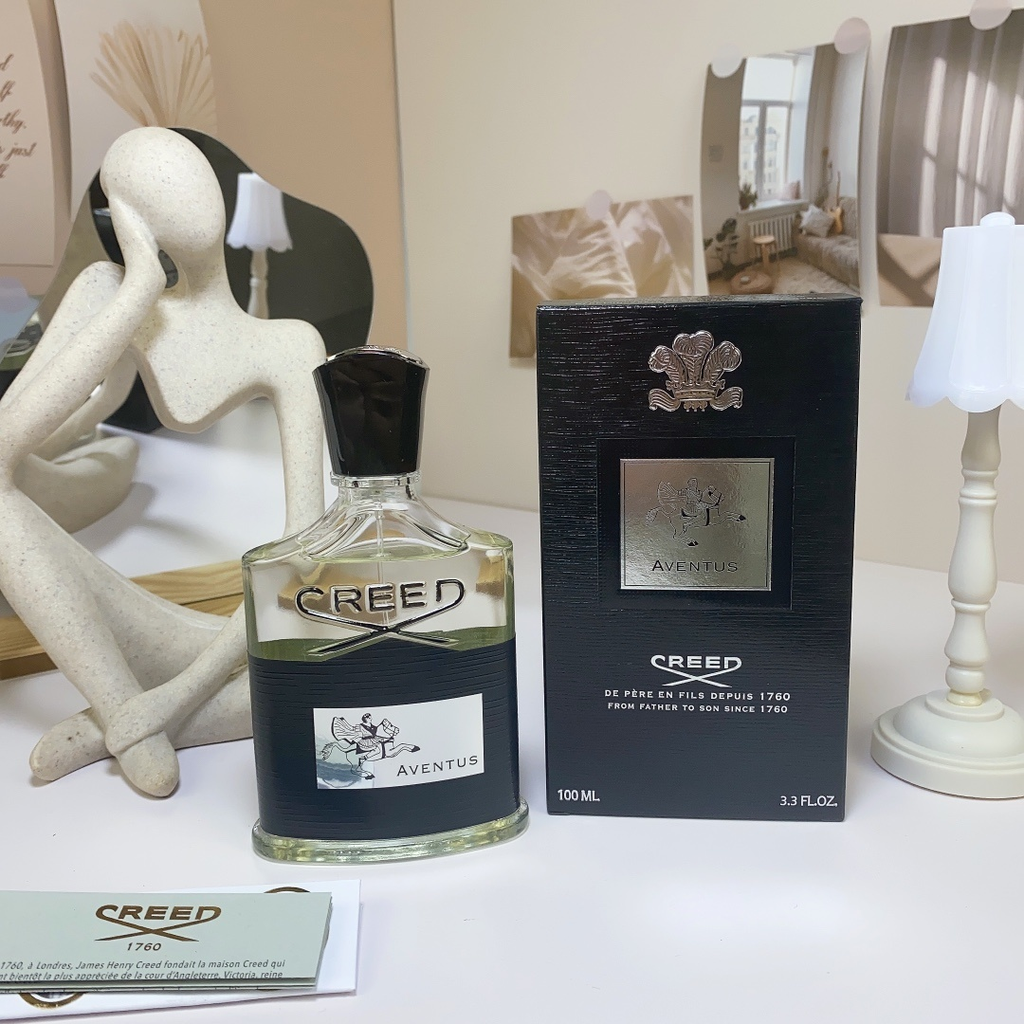 Creed Aventus EDP 100ml bottle and box on table