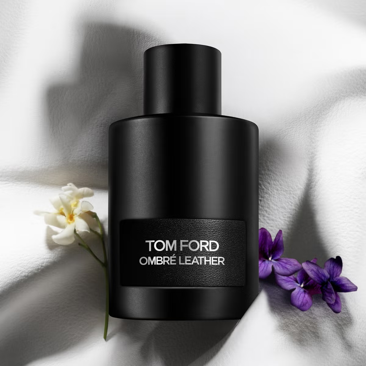 Tom Ford Ombre Leather matte black bottle with jasmine flowers